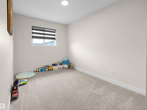 209 Desrochers Boulevard Sw, Edmonton, AB - Indoor Photo Showing Other Room