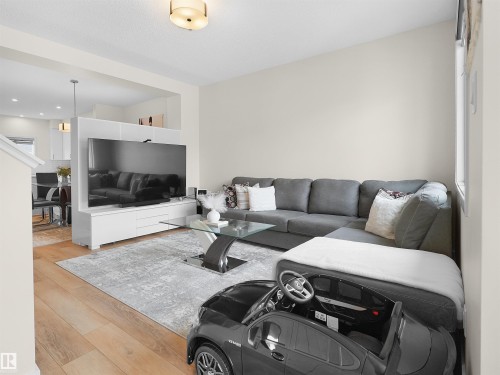 209 Desrochers Boulevard Sw, Edmonton, AB - Indoor Photo Showing Living Room