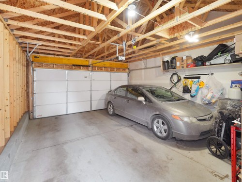 209 Desrochers Boulevard Sw, Edmonton, AB - Indoor Photo Showing Garage