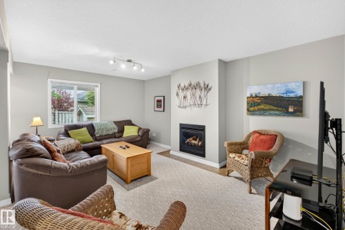 12 Otter Crescent, St. Albert, AB - Indoor Photo Showing Living Room With Fireplace