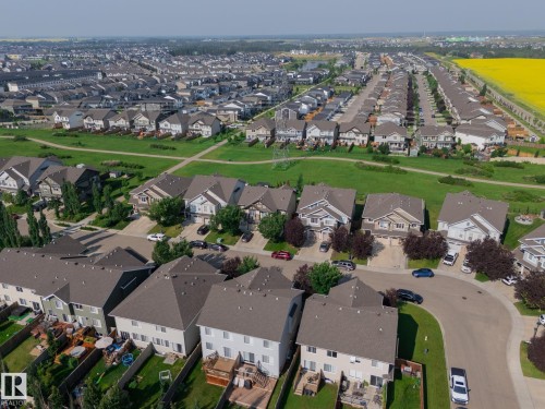 Residential neighborhood featuring a variety of detached and semi-detached homes, established streets, and green spaces - 1640 Chapman Way Sw, Edmonton, AB - Outdoor With View