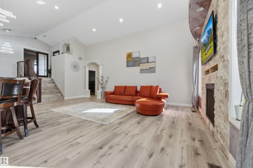 Living room with open concept kitchen and vaulted ceilings - 10819 175 Avenue Nw, Edmonton, AB 