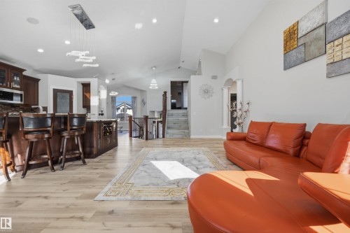 Living room with open concept kitchen and vaulted ceilings - 10819 175 Avenue Nw, Edmonton, AB 