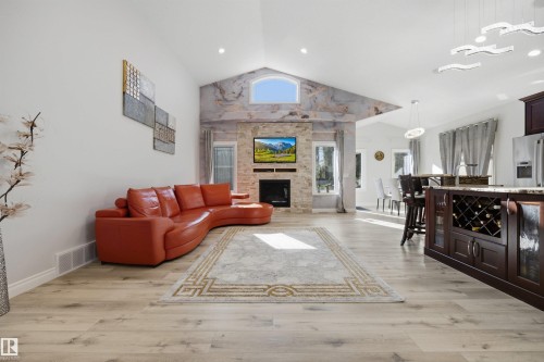 Living room with open concept kitchen and vaulted ceilings - 10819 175 Avenue Nw, Edmonton, AB 