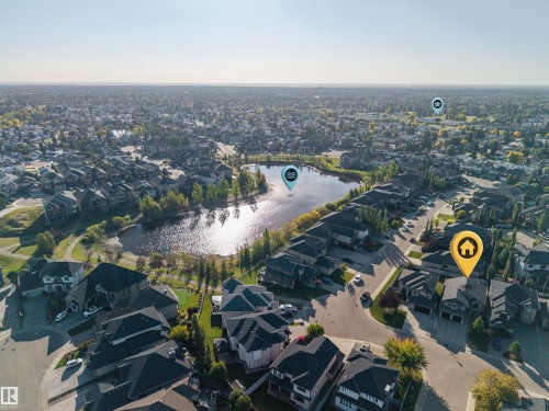 Aerial view of home and the surrounding area including a lake - 10819 175 Avenue Nw, Edmonton, AB 