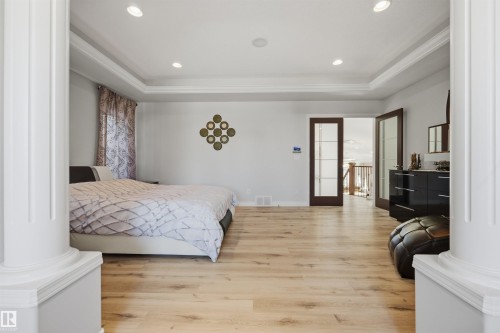 Exceptionally large and private primary bedroom with 4 PC ensuite, ambient lighting, and large walk-in closet - 10819 175 Avenue Nw, Edmonton, AB 