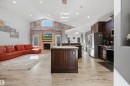 Living room with open concept kitchen and vaulted ceilings - 10819 175 Avenue Nw, Edmonton, AB 