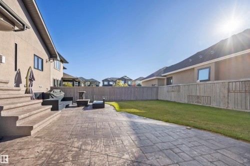 View of stamped concrete creating backyard patio - 10819 175 Avenue Nw, Edmonton, AB 