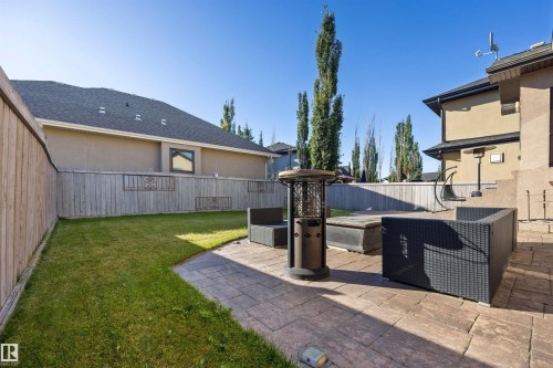 View of stamped concrete creating backyard patio - 10819 175 Avenue Nw, Edmonton, AB 