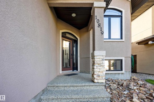 Entrance with glass-insert front door - 10819 175 Avenue Nw, Edmonton, AB 