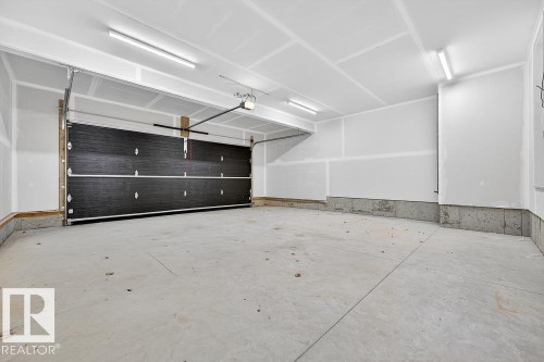 132 Heron Point Close, Rural Wetaskiwin County, AB - Indoor Photo Showing Garage