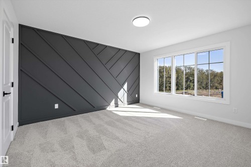 Feature wall with geometric paneling - 960 Elderberry Landing Nw, Edmonton, AB 