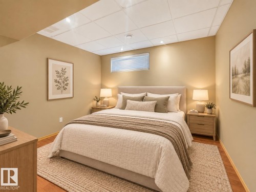 Recessed lighting, wood-finish flooring, drop ceiling, and a built-in window - 1271 Ormsby Lane Nw, Edmonton, AB 