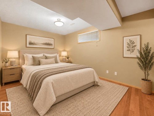 Hardwood flooring, recessed window, flush-mount ceiling light, light-toned wall paint - 1271 Ormsby Lane Nw, Edmonton, AB 