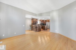 Light wood-finish flooring with a neutral wall color - 