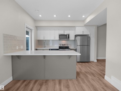 #3 446 Allard Bv Sw, Edmonton, AB - Indoor Photo Showing Kitchen With Stainless Steel Kitchen With Upgraded Kitchen
