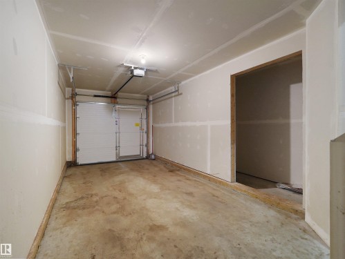 #3 446 Allard Bv Sw, Edmonton, AB - Indoor Photo Showing Garage
