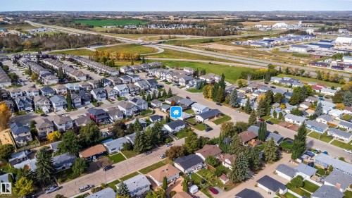 Residential neighborhood setting with mature trees and paved streets - 4104 44 Street, Stony Plain, AB 