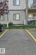 Parking Stall #222 on Northside of Building and Steps to Entrance - 