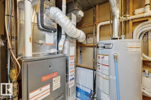 Goodman furnace and hot water heater with associated ductwork and plumbing - 15012 77 Avenue Nw, Edmonton, AB 