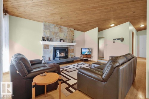 Wood-finish ceiling with recessed lighting - 15012 77 Avenue Nw, Edmonton, AB 