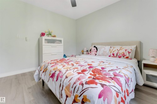 Light-toned walls, wood-finish flooring, and a ceiling fan - #37 23020 Township Road 522 Rd, Rural Strathcona County, AB 