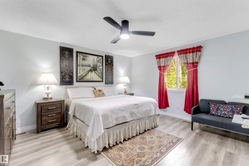 Recessed lighting, wood-finish flooring, ceiling fan, and window with natural light - #37 23020 Township Road 522 Rd, Rural Strathcona County, AB 