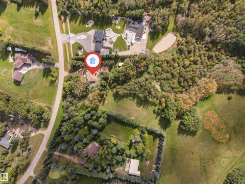 Property with surrounding mature trees and expansive green spaces - #37 23020 Township Road 522 Rd, Rural Strathcona County, AB 
