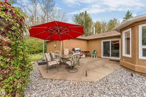 Expansive stucco exterior with large windows - #37 23020 Township Road 522 Rd, Rural Strathcona County, AB 