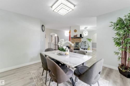 Recessed lighting, wood-finish flooring, and a decorative archway - #37 23020 Township Road 522 Rd, Rural Strathcona County, AB 