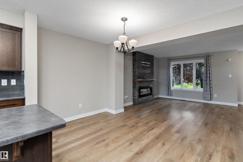 2174 Trumpeter Way Nw, Edmonton, AB - Indoor With Fireplace