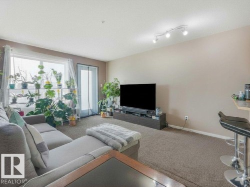 #312 5350 199 St Nw, Edmonton, AB - Indoor Photo Showing Living Room