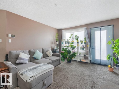 #312 5350 199 St Nw, Edmonton, AB - Indoor Photo Showing Living Room