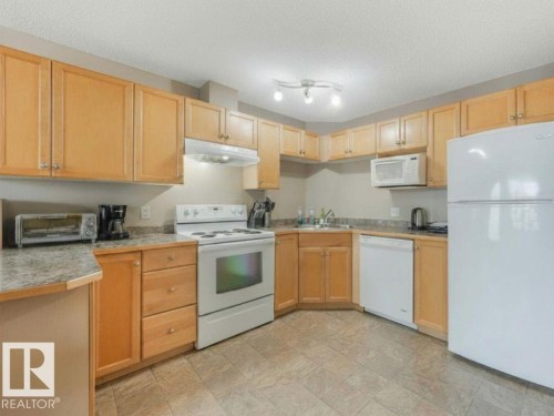 #312 5350 199 St Nw, Edmonton, AB - Indoor Photo Showing Kitchen