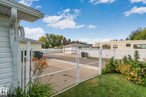 Chain link fencing with gated access to paved surface - 14724 73 Street Nw, Edmonton, AB 