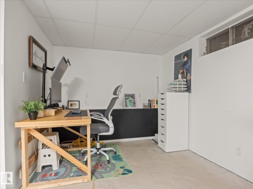 White walls with a drop ceiling and concrete flooring - 4 Lovatt Place, St. Albert, AB - Indoor Photo Showing Office