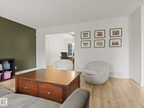 Light wood-finish flooring throughout - 4 Lovatt Place, St. Albert, AB - Indoor