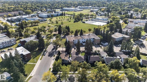 Aerial perspective showcasing residential properties amidst mature trees and green spaces - 14611 109 Avenue Nw, Edmonton, AB 
