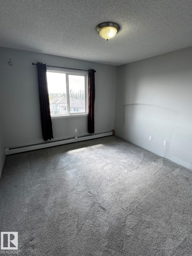 #428 2305 35A Av Nw, Edmonton, AB - Indoor Photo Showing Other Room