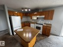 #428 2305 35A Av Nw, Edmonton, AB  - Indoor Photo Showing Kitchen With Double Sink 