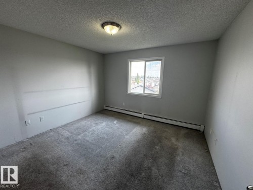 #428 2305 35A Av Nw, Edmonton, AB - Indoor Photo Showing Other Room