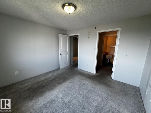 #428 2305 35A Av Nw, Edmonton, AB - Indoor Photo Showing Other Room
