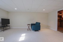 Recessed lighting, painted walls, wall-to-wall carpeting, and a drop ceiling - 