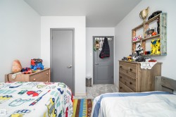 Light gray walls with matching interior doors - 
