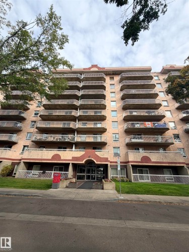 Multi-story residential building with private balconies and a ground-level entrance - #503 11211 85 St Nw, Edmonton, AB 