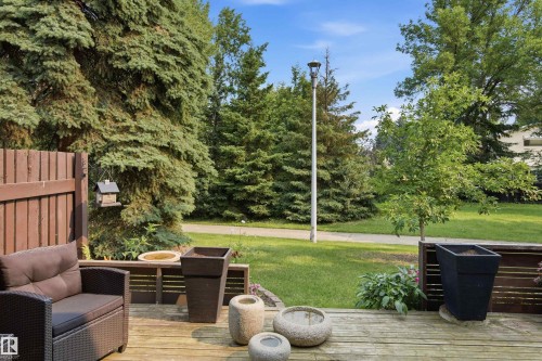 Expansive wooden deck featuring perimeter fencing - 141 Hearthstone Nw, Edmonton, AB - Outdoor With Deck Patio Veranda