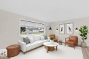Hardwood-finish flooring, recessed lighting, and a large window with horizontal blinds - 13511 114 Street Nw, Edmonton, AB 