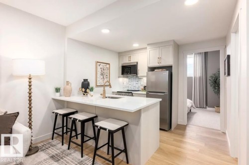 5611 Parc Reunis Way, Beaumont, AB - Indoor Photo Showing Kitchen With Upgraded Kitchen