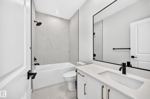 White vanity with a rectangular undermount sink and matte black faucet - 9 Tilia Place, Spruce Grove, AB 
