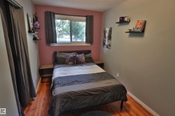 Wood-finish flooring with light-toned walls - 